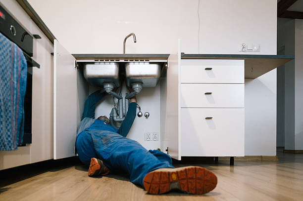 Professional Drain Cleaning technician working in Summersville, MO